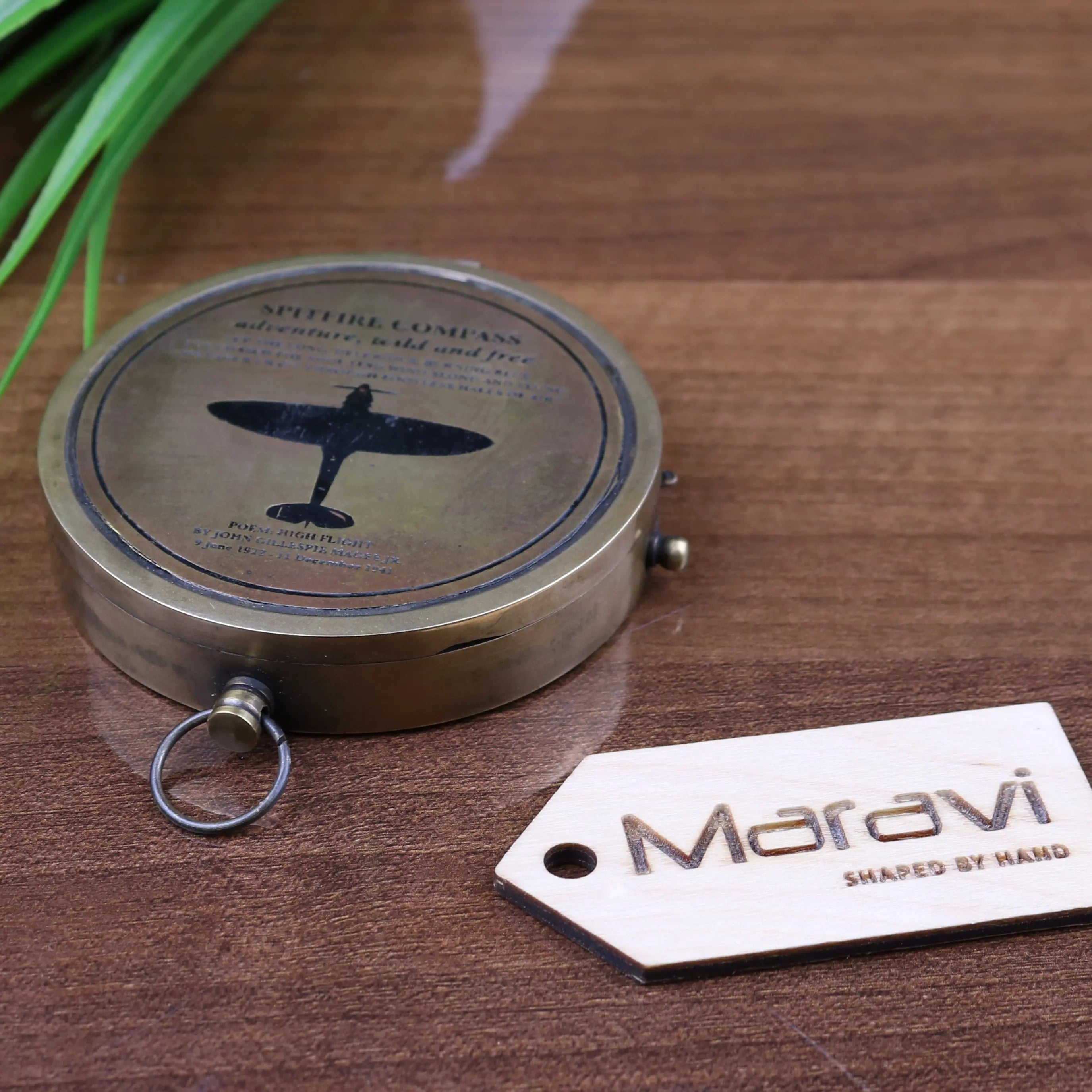 Antique brass spitfire compass with black airplane silhouette and high flight poem engraving plus metal ring attachment