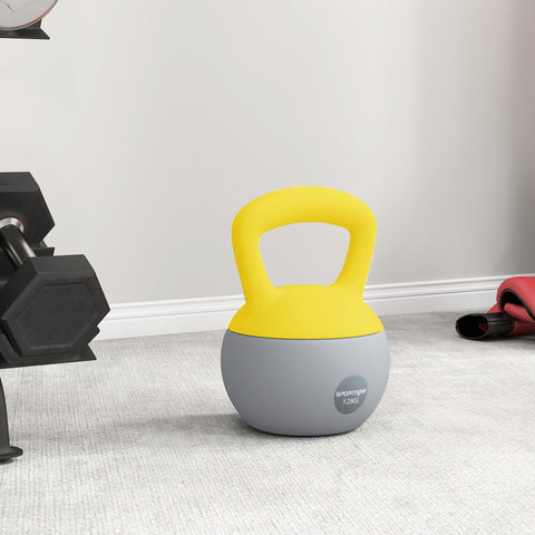 A vibrant yellow and gray sportnow 12kg soft kettlebell with non-slip handle for home gym strength training