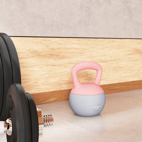 Sportnow 12kg soft kettlebell in pastel pink and gray with a non-slip handle and metal sand filling for strength training