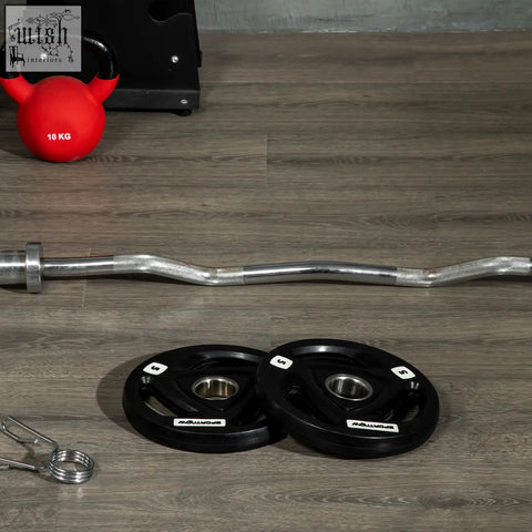Silver curved barbell with textured grip and black 5kg weight plates for home gym and strength training