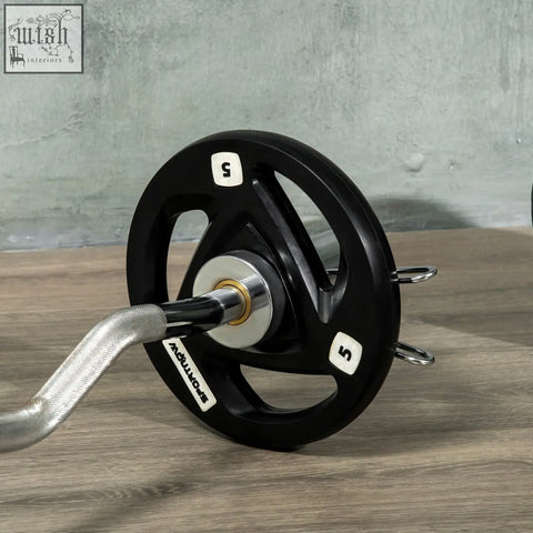Black squat branded 5kg weight plate with silver center and rubber coating perfect for home gym lifting