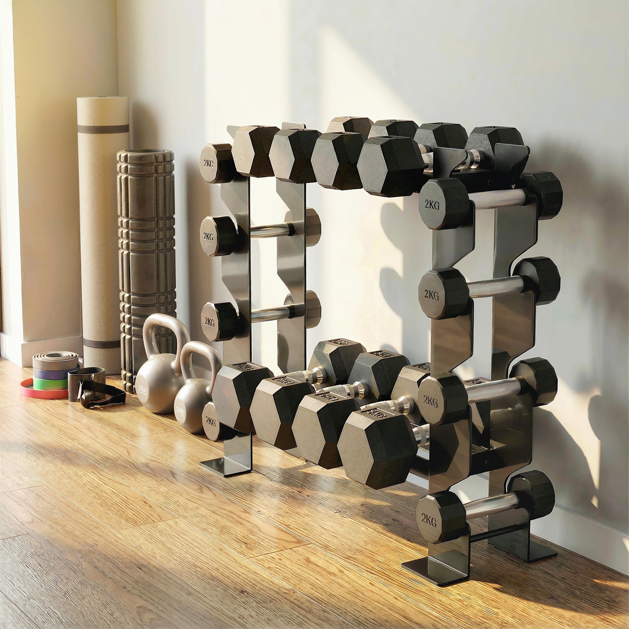 Black hexagonal dumbbells with silver plates neatly arranged on sportnow black metal dumbbell rack for easy access