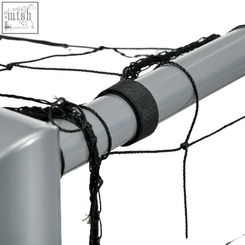 Black mesh netting secured with black elastic strap around gray pole on sportnow 8ft x 5ft football goal back side