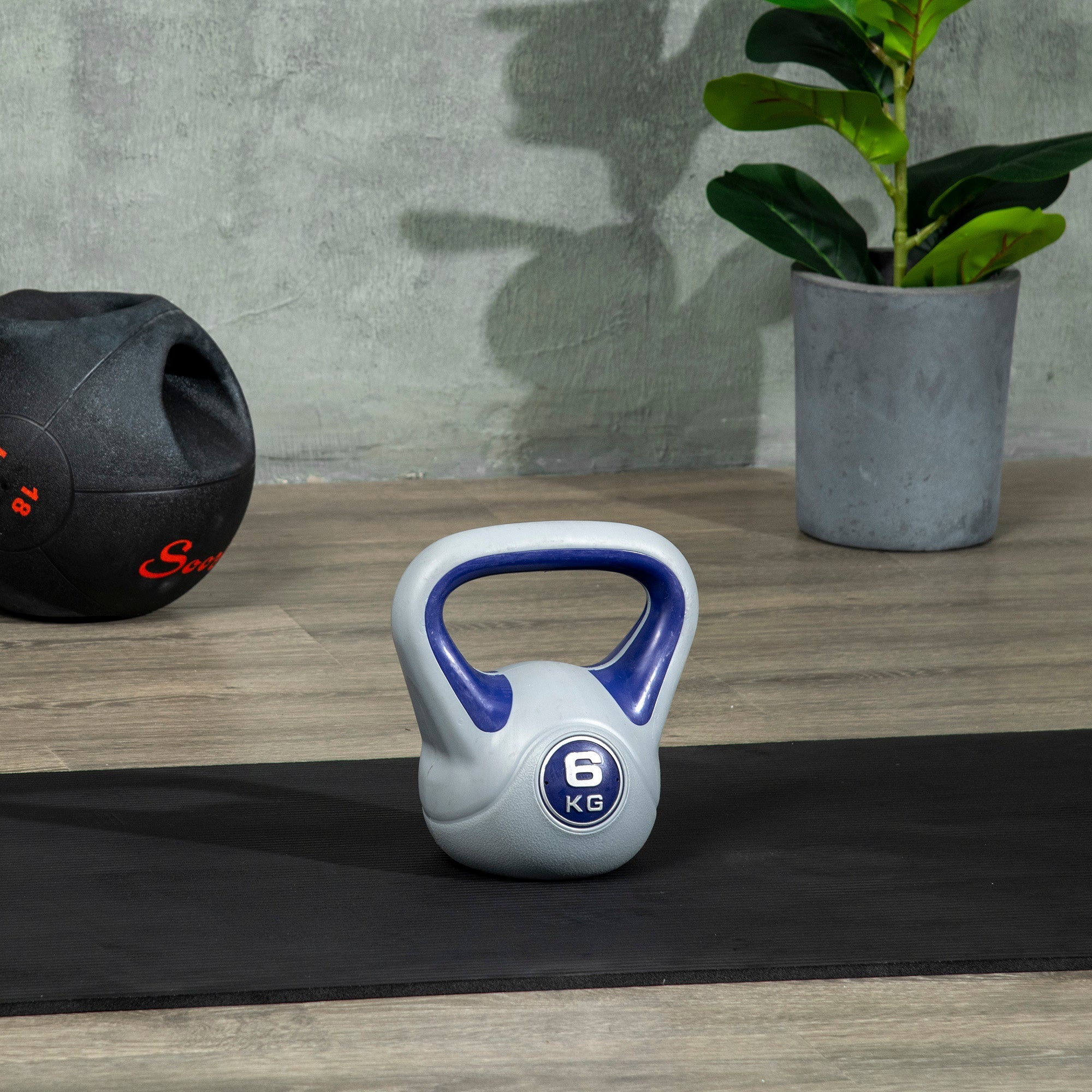 Sportnow kettlebell 6kg with matte gray body and blue handle designed for home gym strength training
