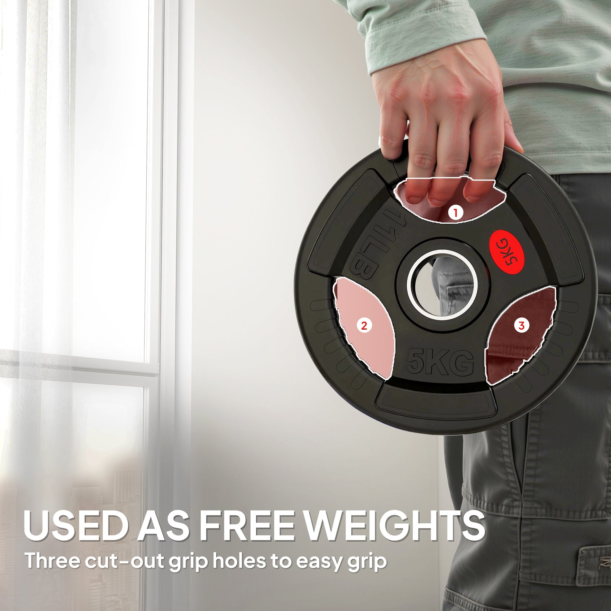 Black olympic weight plates 5kg with red and pink tri-grip cutouts for easy handling and home gym workouts
