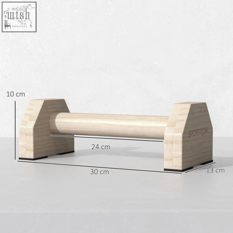 Light-colored sportnow wooden parallettes bars with smooth natural finish and engraved branding for home gym use