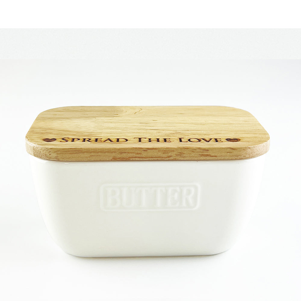 White ceramic butter dish with natural wood lid engraved with spread the love and two hearts perfect to spread love