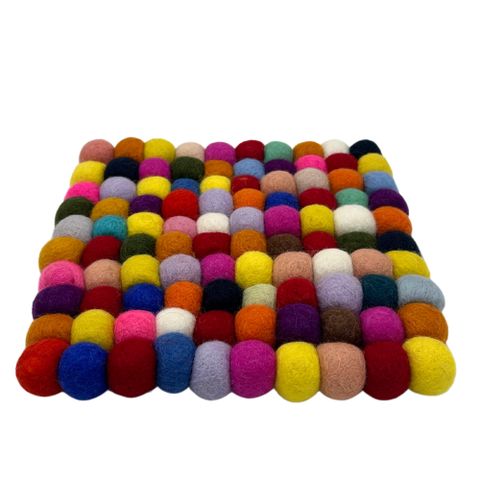 Square felt ball placemat with multicolour vibrant felt spheres in reds blues yellows and purples for table use