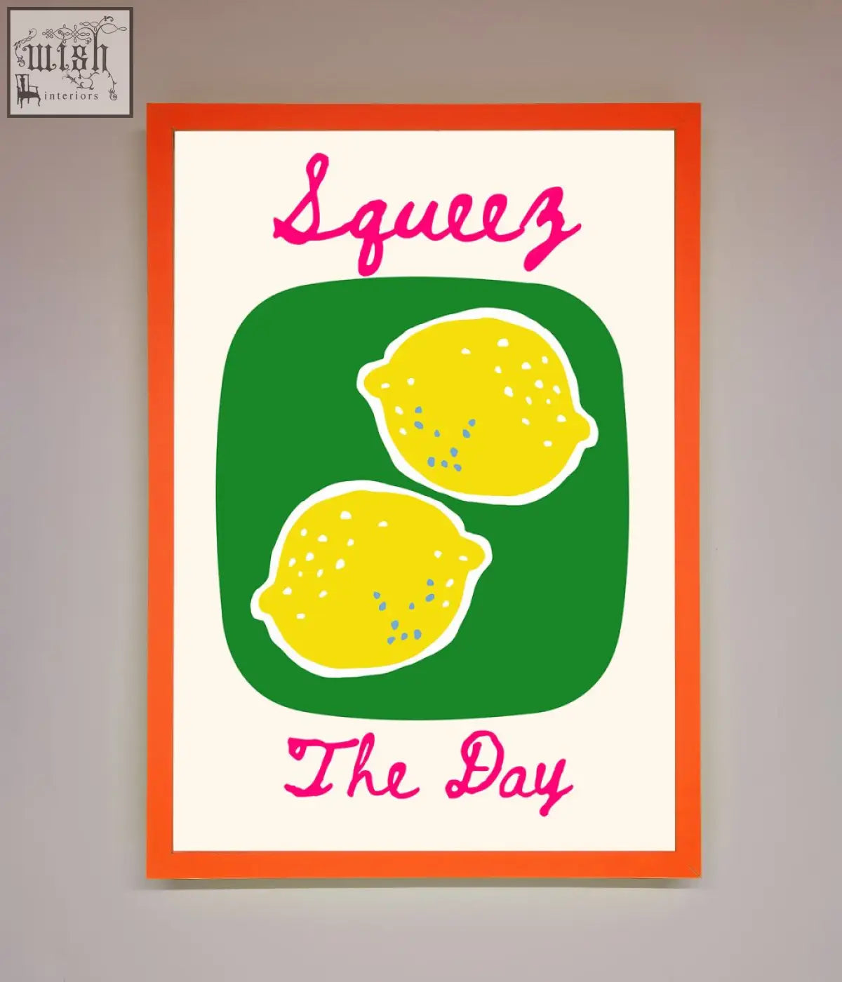 A vibrant day framed poster with an orange frame featuring two yellow lemons and pink squeeze the day text on green background