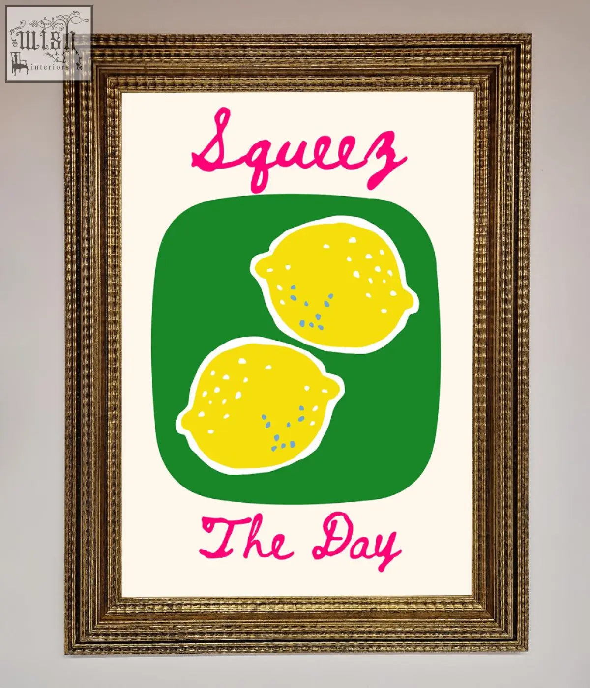 A day framed poster featuring two yellow lemons on a green background with pink squeeze the day text