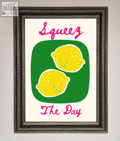 A day framed poster featuring two stylized yellow lemons on green with pink script text squeeze the day