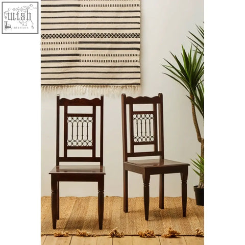 Dark brown sheesham wood dining chair with intricate lattice back design perfect for wood dining setups
