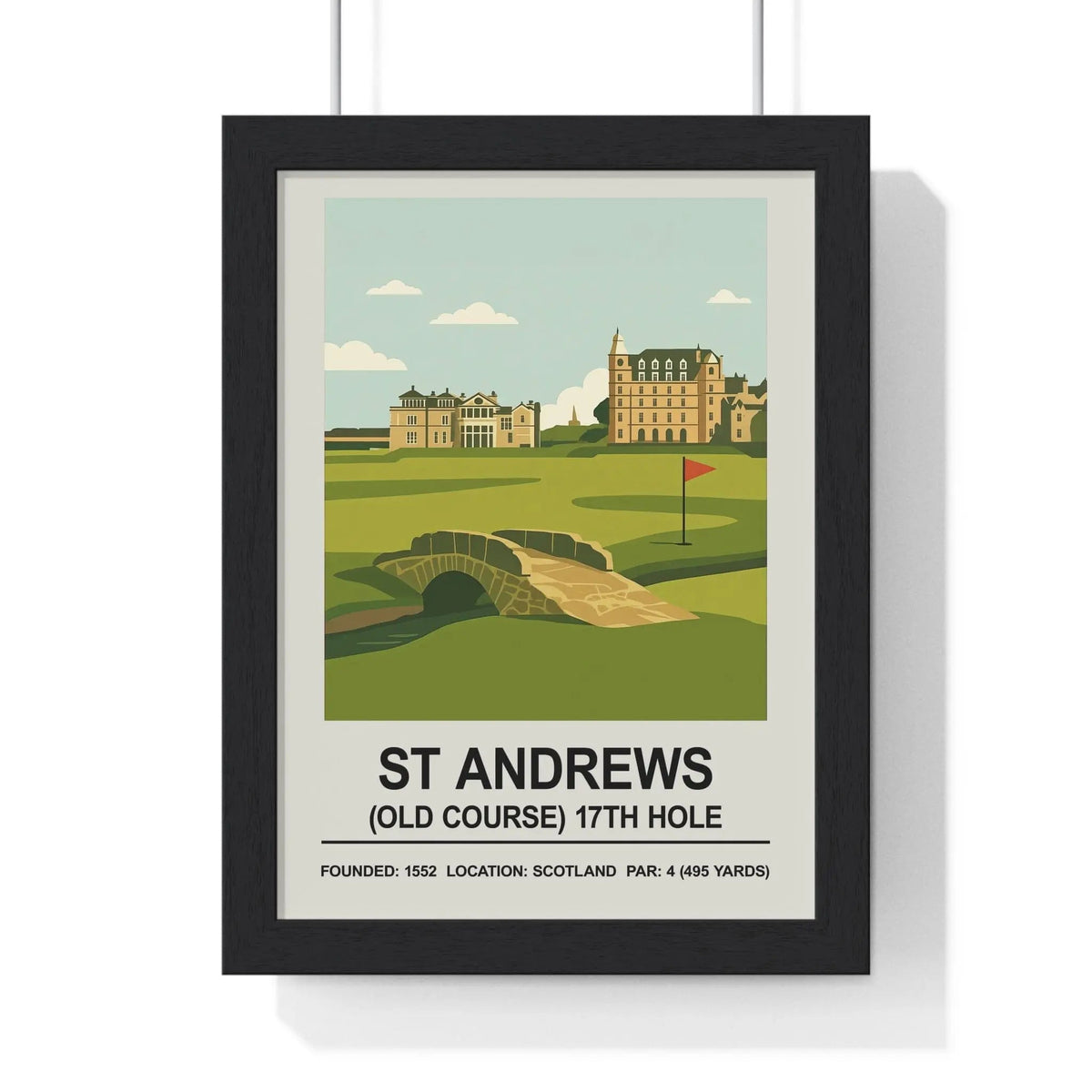 Black-framed poster featuring stylized illustration of the 17th hole at st andrews old course with green fairways and stone bridge