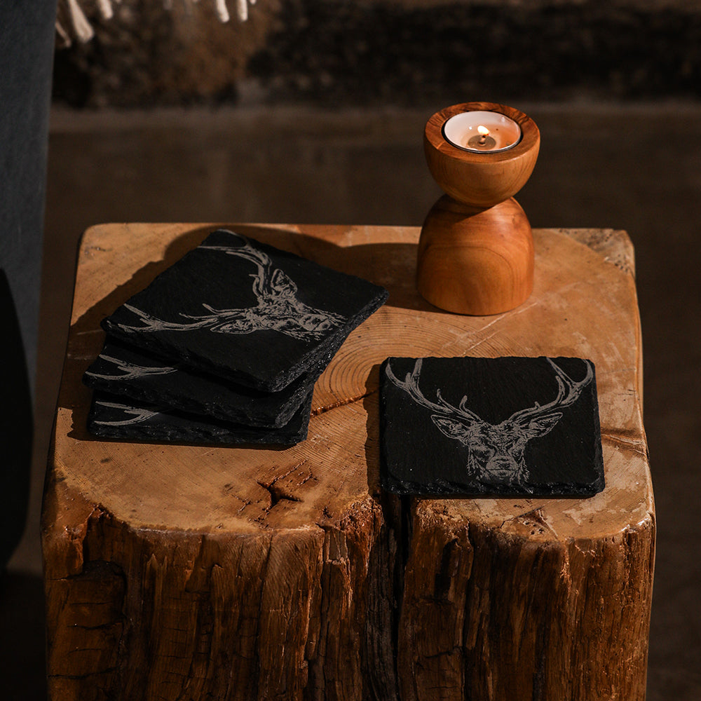 Black slate coasters set of 4 with engraved white stag head designs perfect for stylish drink protection