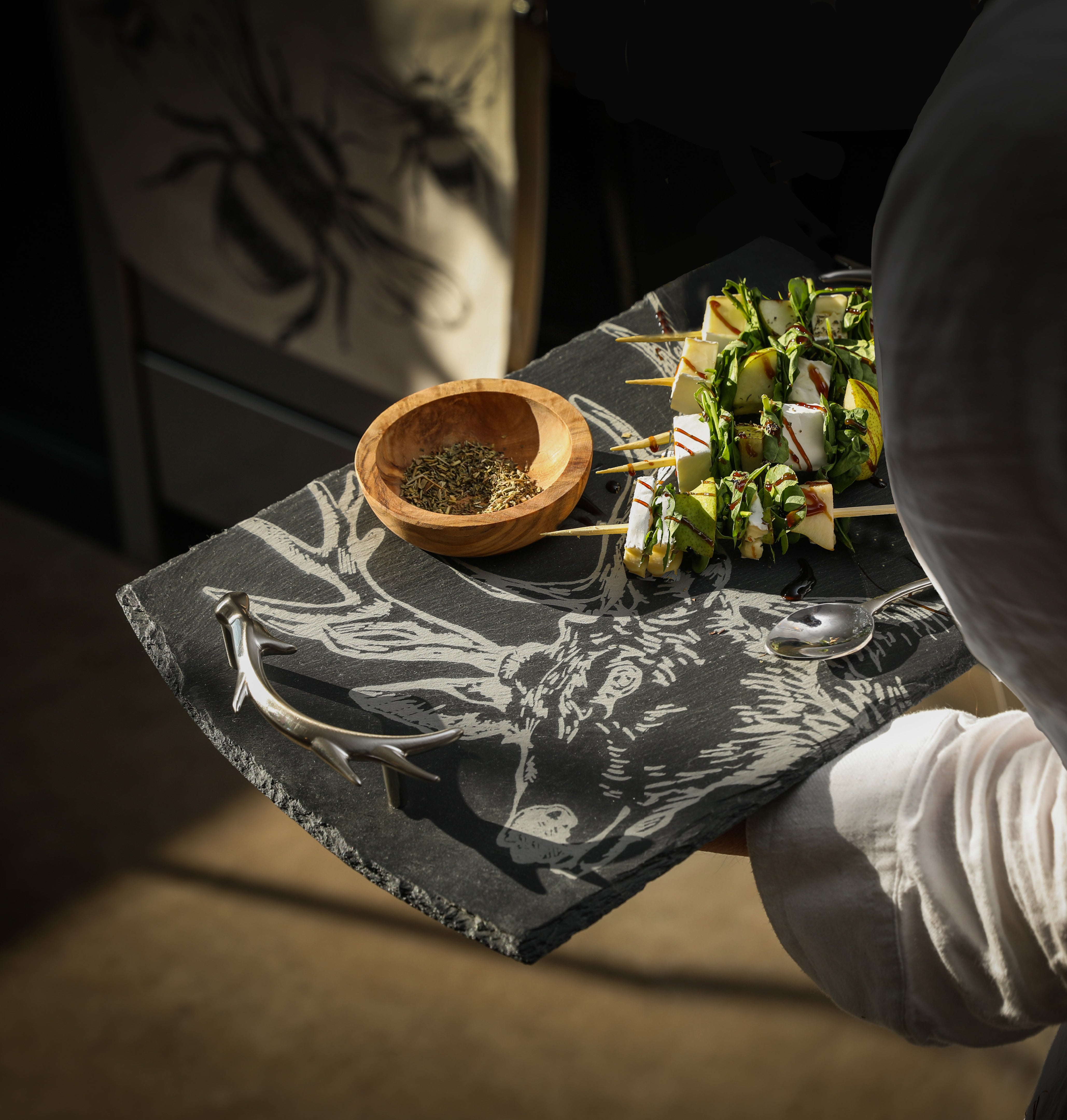 Black slate serving tray with engraved deer design and silver antler handles perfect for slate serving