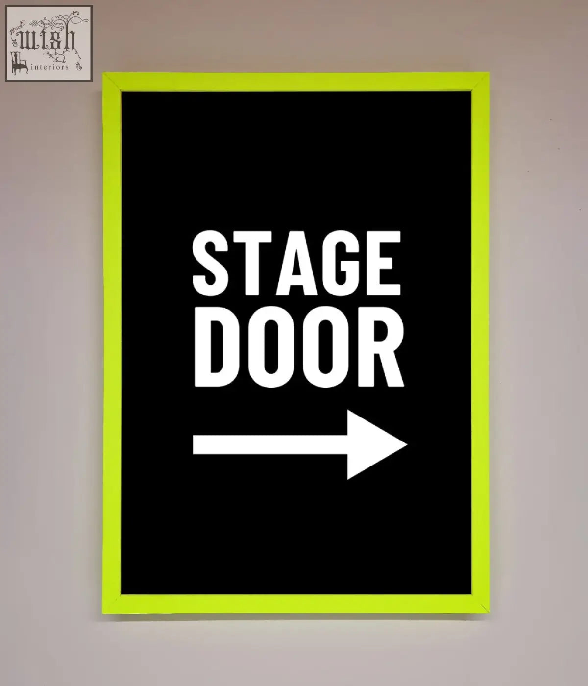 Neon green stage door framed print with bold white text on black background and a right pointing arrow sign