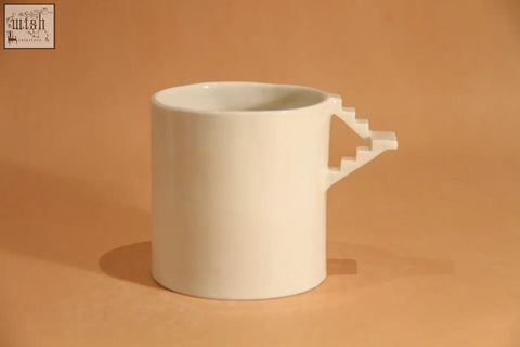 White ceramic mug with a staircase handle from stairs series mug 3 by 4am product design