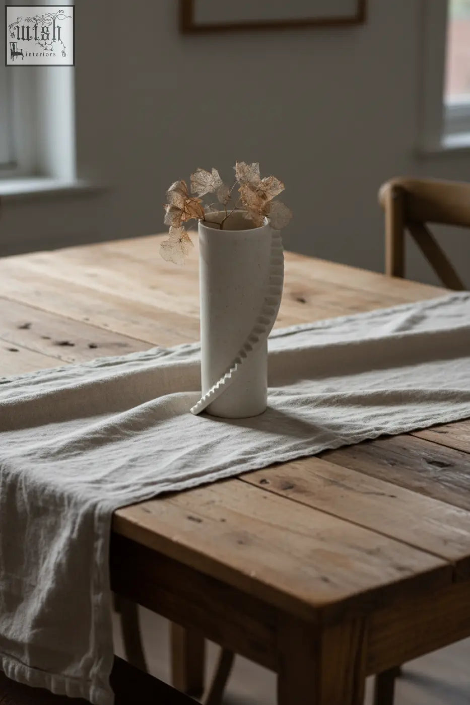 Minimalist white ceramic stairs series vase with subtle spiral texture holding dried flowers by 4am product design
