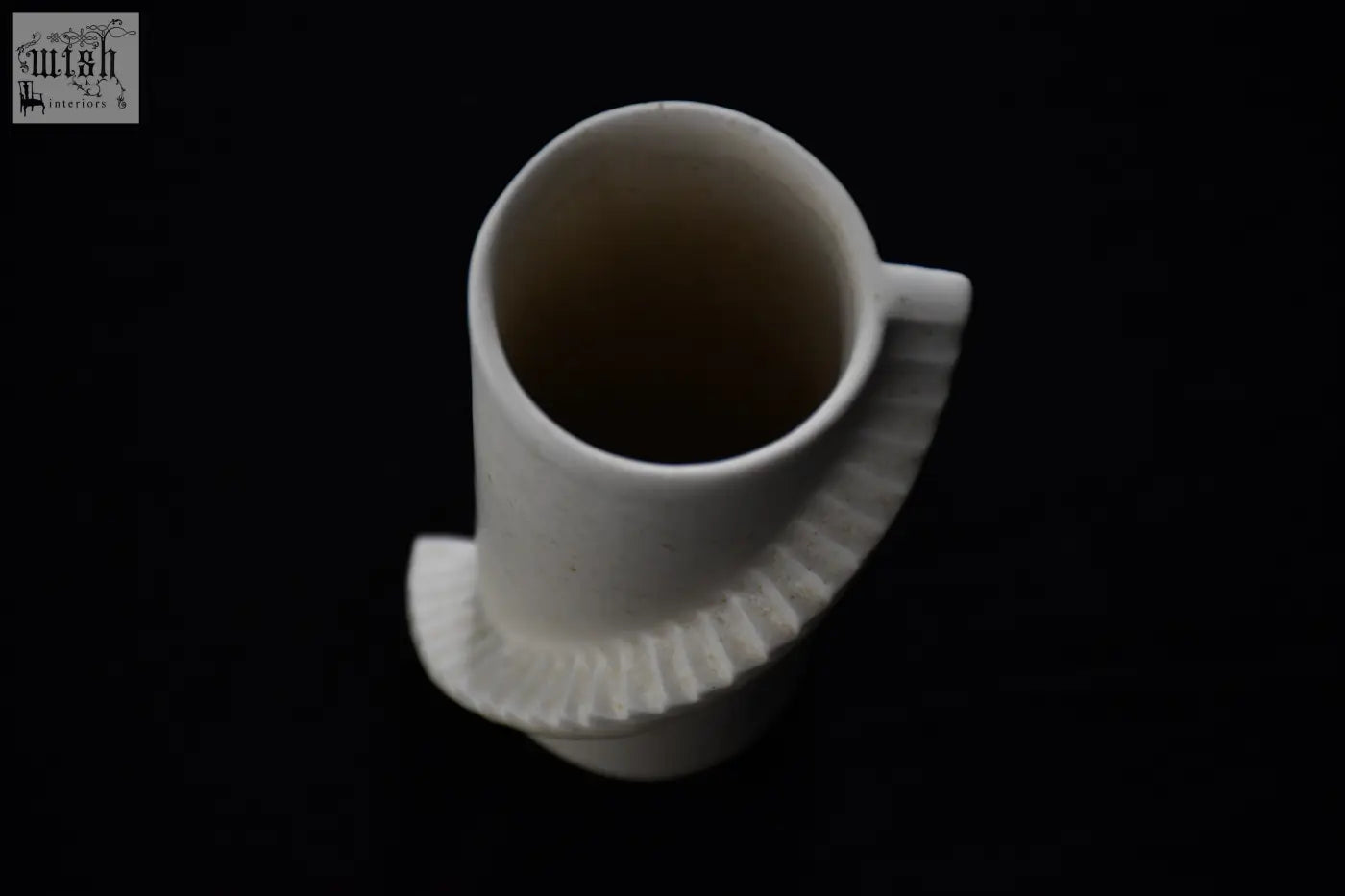 White ceramic mug with fluted scalloped handle and rim from 4am product design stairs series vase collection