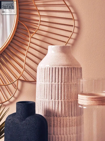 Cream-colored glazed stoneware large vase with vertical ribbed texture and tapered neck steen large vase