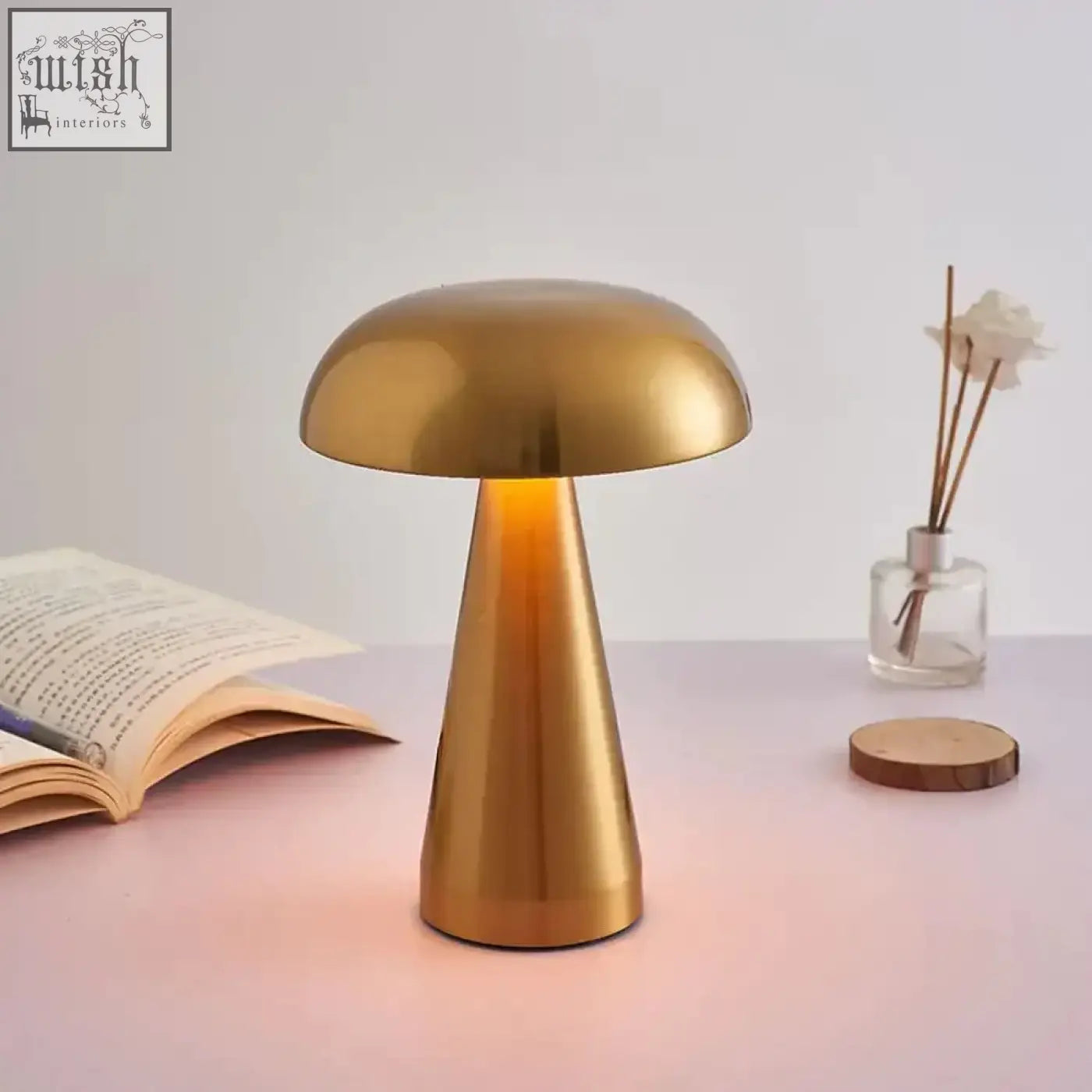 Golden mushroom-shaped stella table lamp with sleek metallic finish built-in rechargeable battery and led bulbs