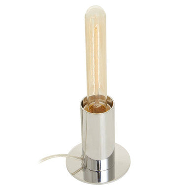A stockholm chrome finish table lamp with a polished chrome base and an exposed edison-style warm amber bulb