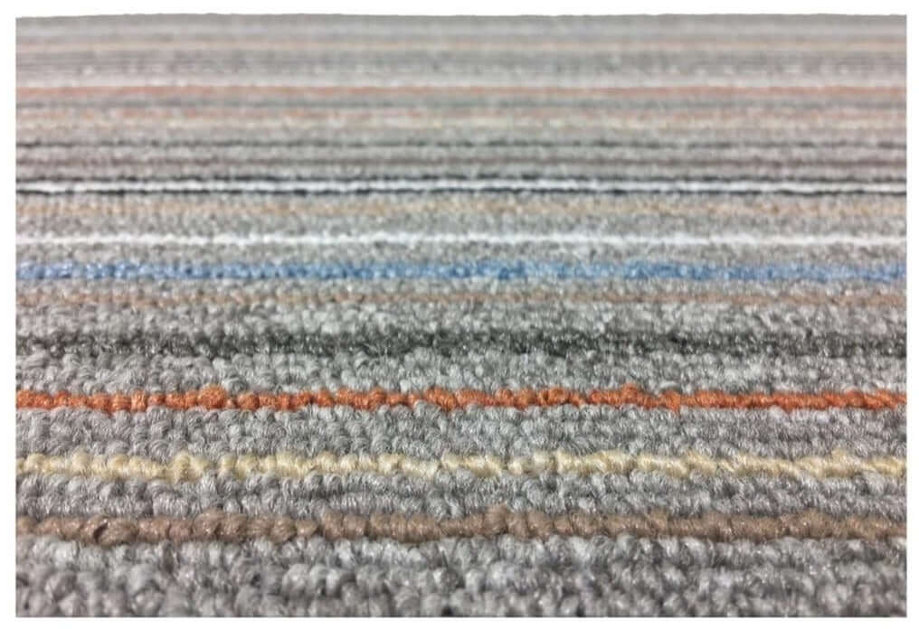 Stockholm grey clay washable mat with gray carpet and horizontal stripes in beige blue orange and brown muted tones