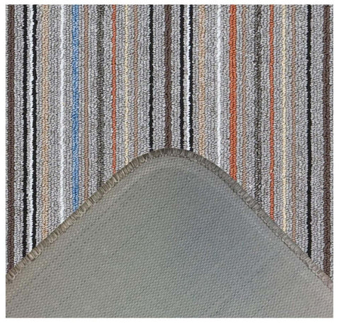 A stockholm grey clay washable mat with grey stripes and loop pile texture perfect for bathroom use