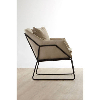 Beige upholstered stockholm stone armchair with sleek black metal frame perfect for modern living spaces
