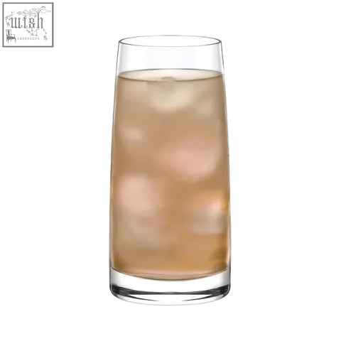 Tall clear stolzle experience highball glass filled with light amber soft drink and ice cubes perfect for soft drinks