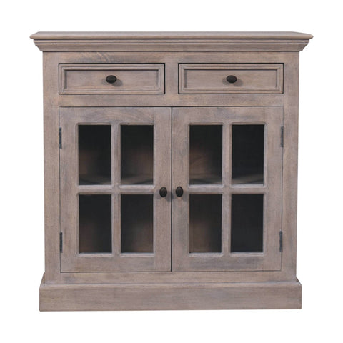 Gray distressed stone finish cabinet with glazed doors and dark round knobs featuring two drawers and glass panes