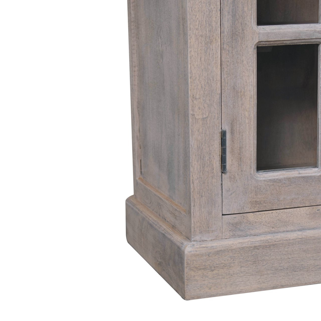 A rustic gray wooden stone finish cabinet with glazed doors and a distressed finish for stylish storage