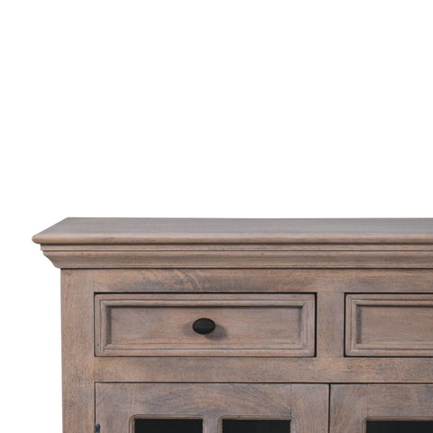 Weathered gray wood stone finish cabinet with black metal pulls and glazed doors for stylish storage