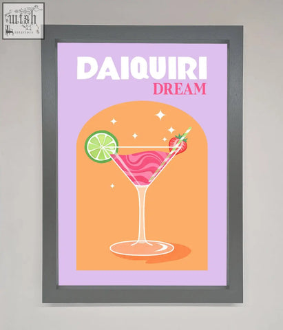 A strawberry daiquiri framed print showing a vibrant pink daiquiri in a martini glass with lime and strawberry garnish