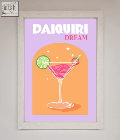 A vibrant pink strawberry daiquiri framed print featuring a cocktail in a martini glass with lime and strawberry garnish