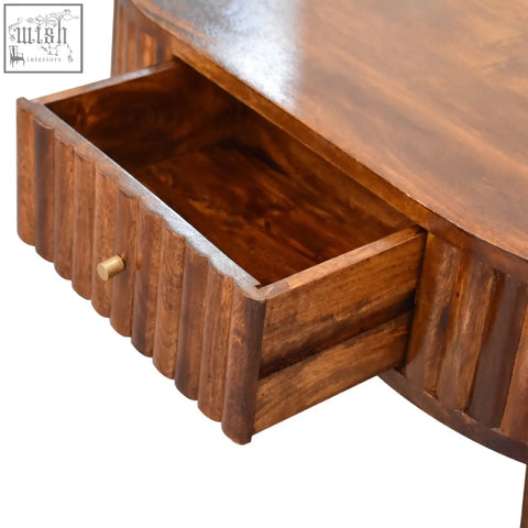 Rich brown stripe chestnut coffee table with curved top drawer fluted sides and brass handle made of mango wood