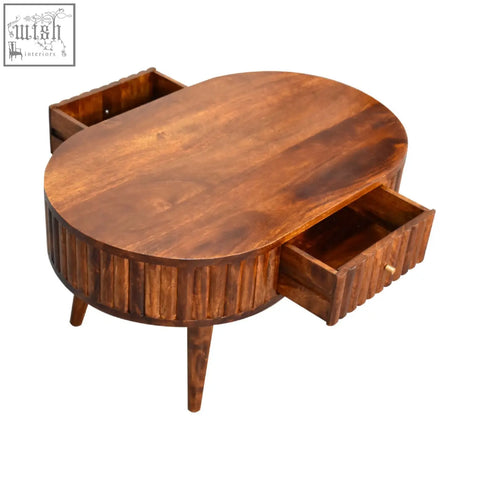 Warm brown stripe chestnut coffee table with vertical grooved sides and two open drawers made of mango wood
