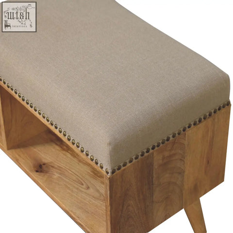 Beige studded linen open bench with brass nailhead trim and solid mango wood frame for stylish seating
