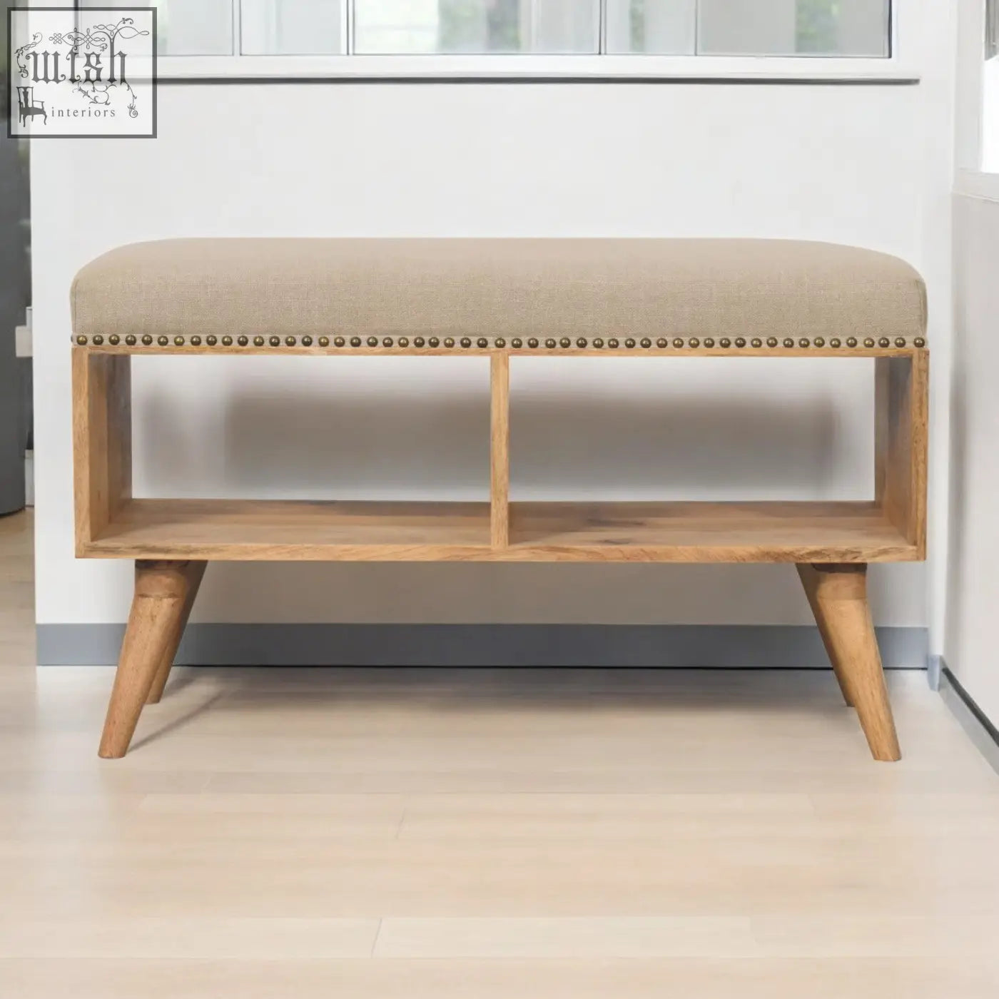 Beige linen open bench with solid mango wood frame and brass nailhead trim perfect for entryway seating