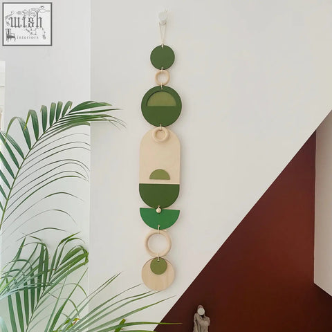 Stylish green geometric wall art wooden wall hanging with circular shapes for minimalistic modern home decor
