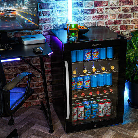 Black glass-door subcold ace130 beer fridge with illuminated interior and subcold branding on top right corner