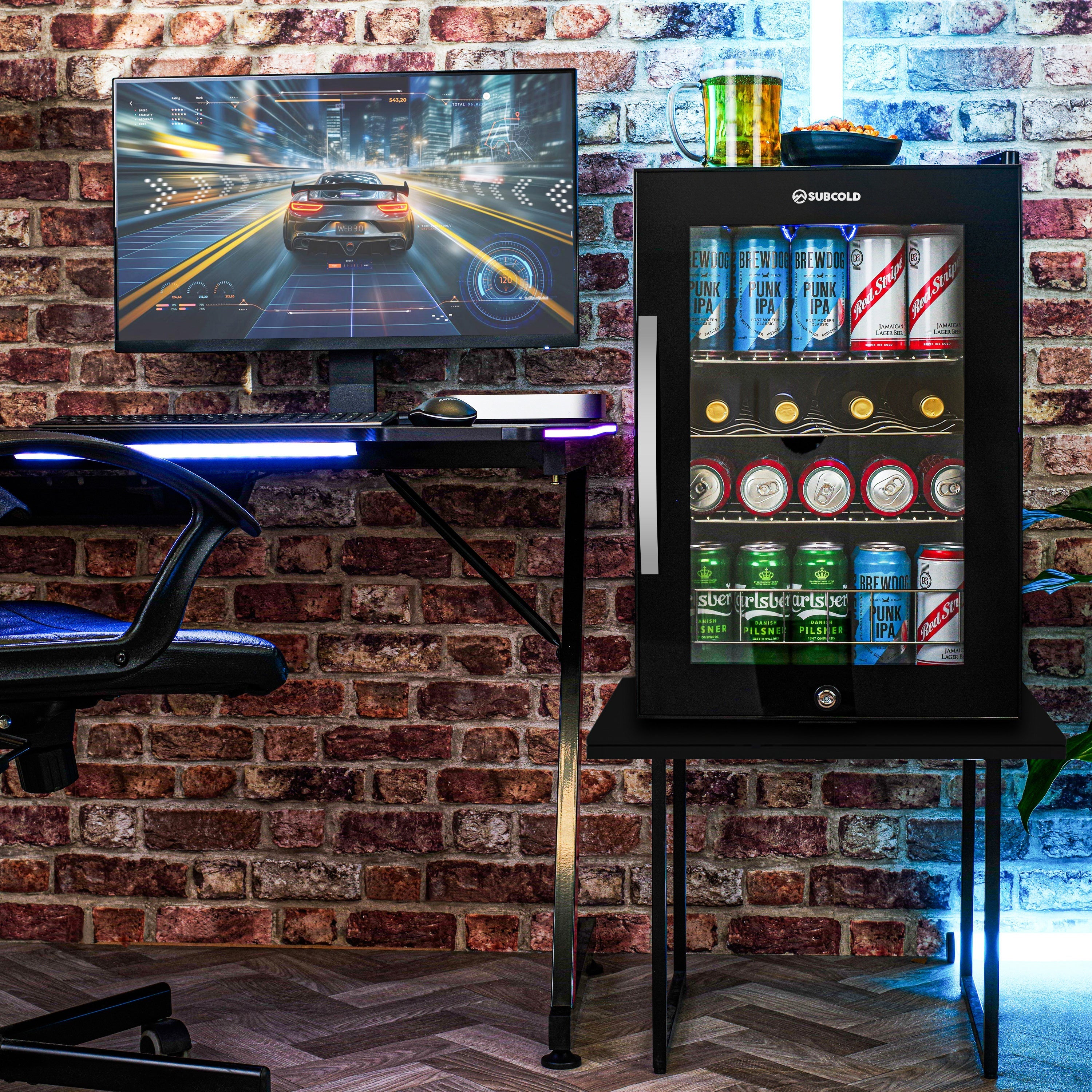Black glass-door subcold ace65 beer fridge with led touch control and illuminated interior showing assorted beer cans