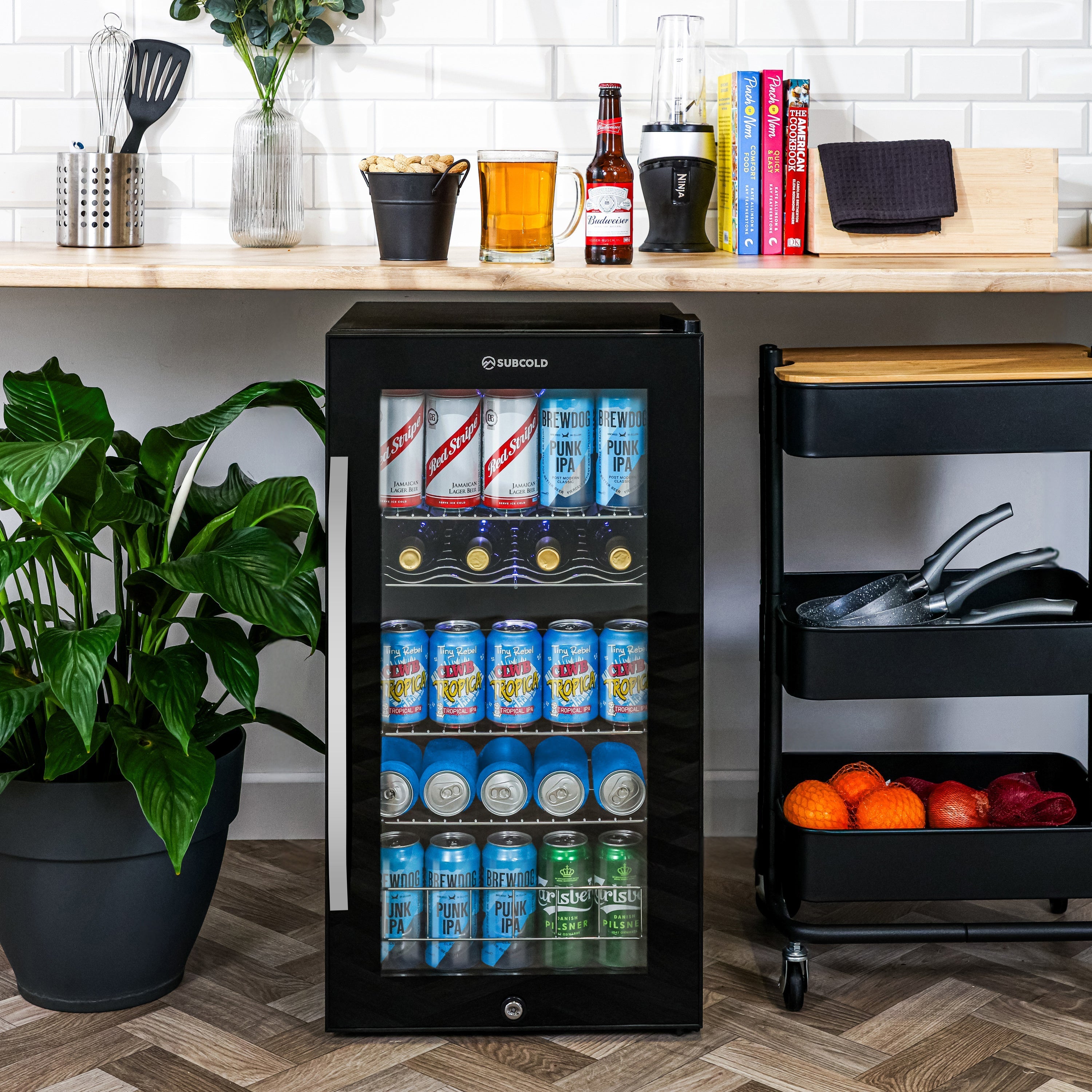 Black glass-door beer fridge with silver handle and subcold ace90 logo for the ace90 beer fridge model
