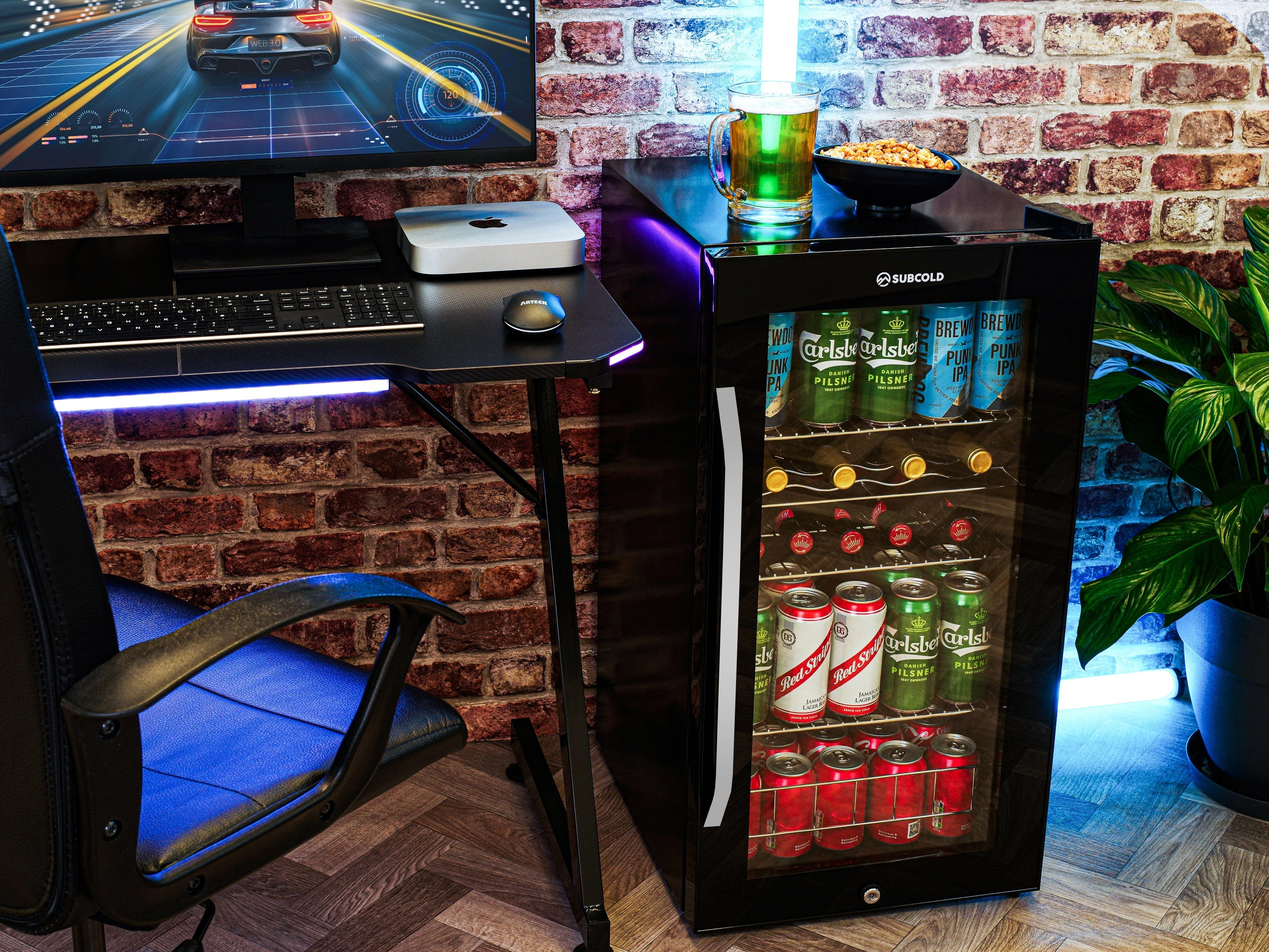 Black subcold ace90 beer fridge with glass door, led touch control, and illuminated interior showing beer cans inside