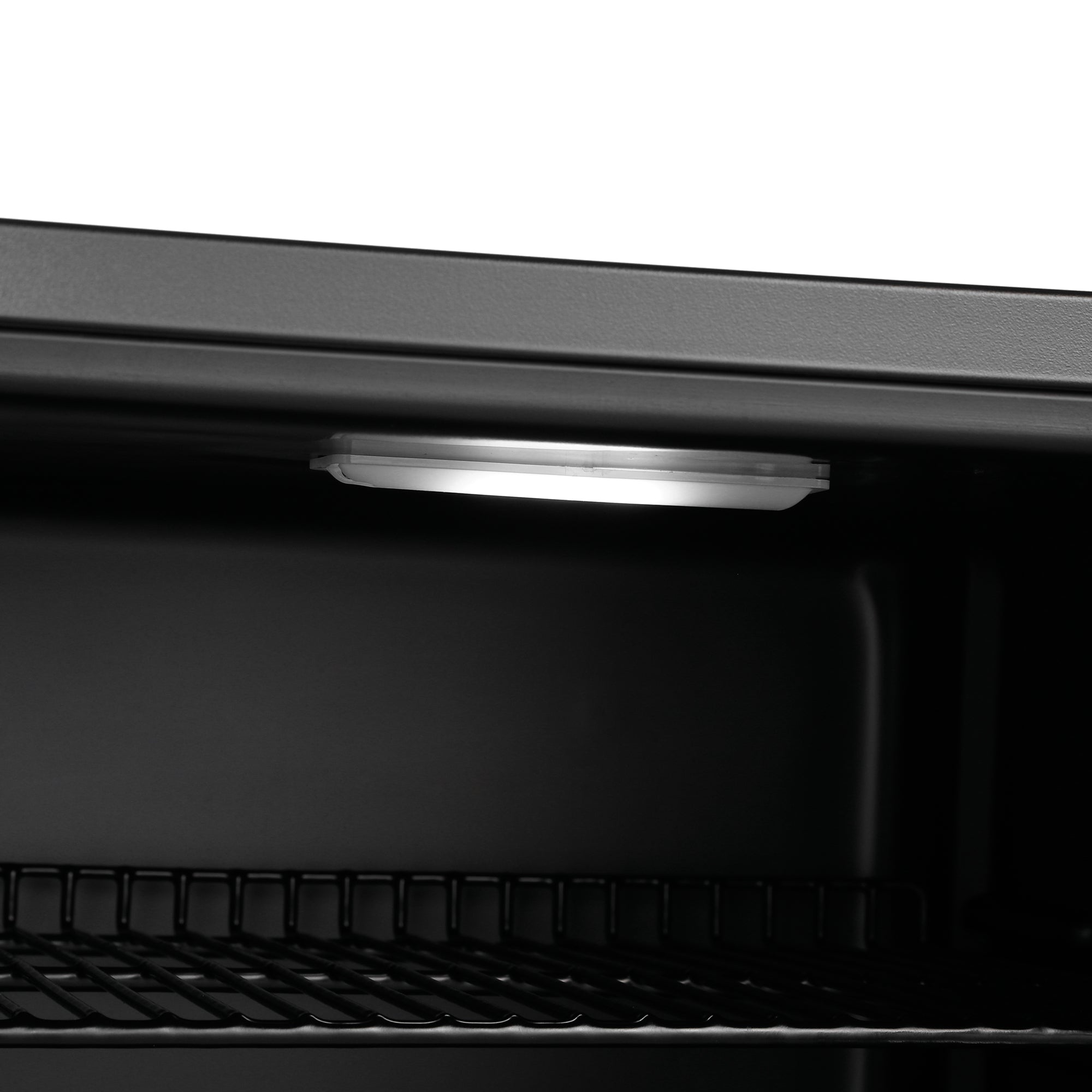 Black interior of subcold cave50 glass door beer fridge with sleek design and built-in led light for soft drinks storage