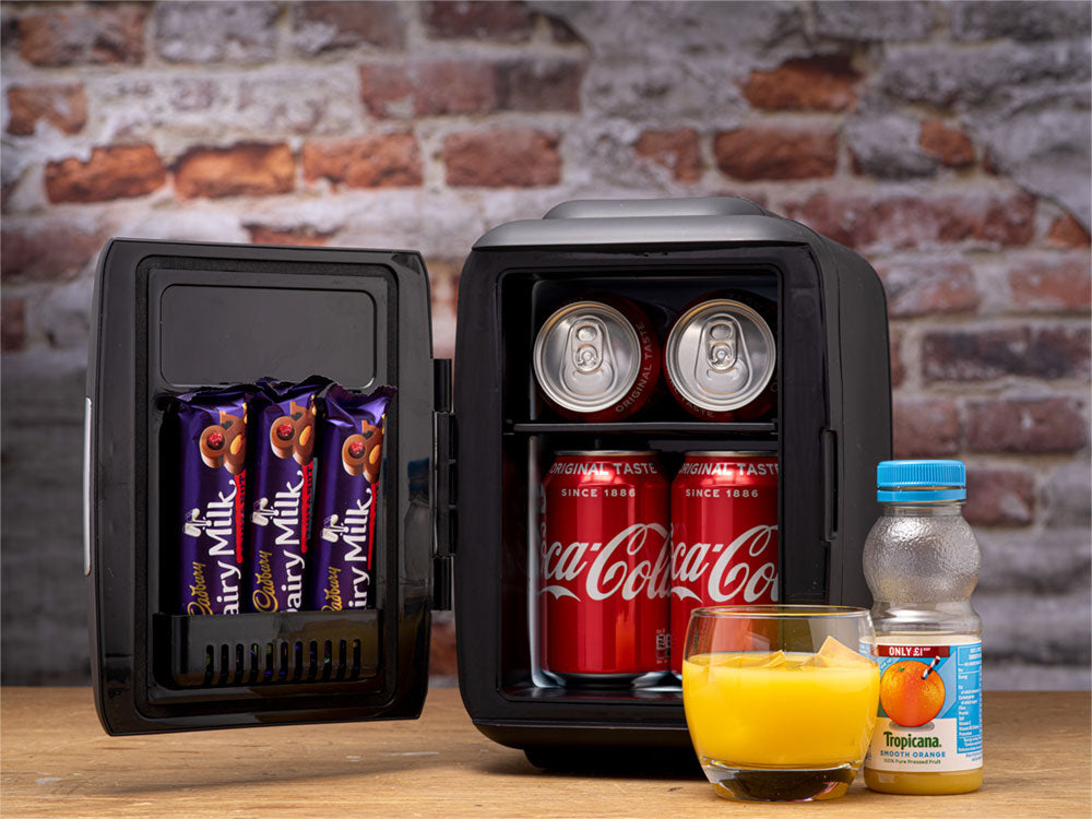 Black Subcold classic 4l mini fridge with open door showing two rows of drinks inside mini cooler design