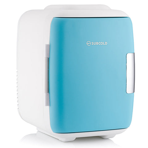 A compact subcold classic 4l mini fridge with a light blue front and white sides perfect for small spaces