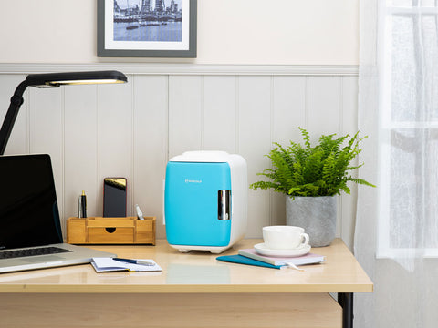 Subcold classic 4l mini fridge with a compact two-tone design featuring a turquoise front panel and white sides mini cooler