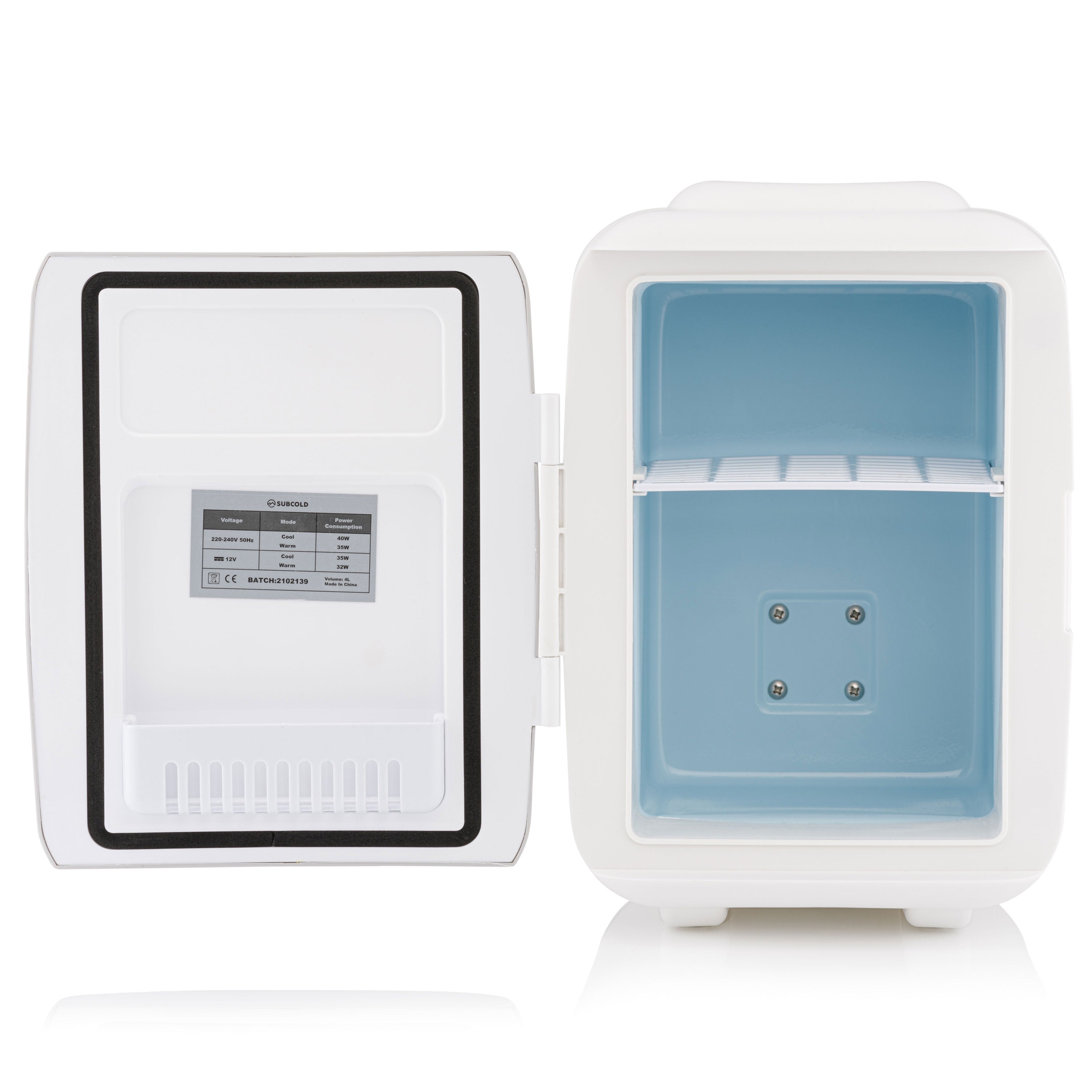 White compact mini fridge with light blue interior and single shelf subcold classic 4l mini fridge interior view