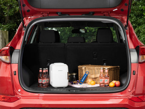 White dometic subcold classic 4l mini fridge with sleek minimalist design perfect as a compact mini cooler